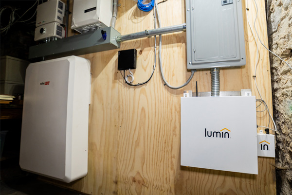 A Lumin Smart Panel connected to the homes service panel and battery backup system